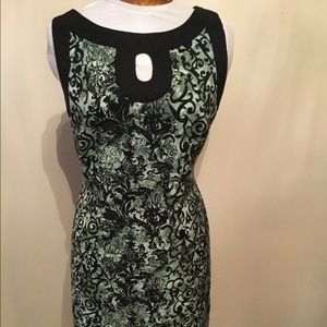 Green and black business dress